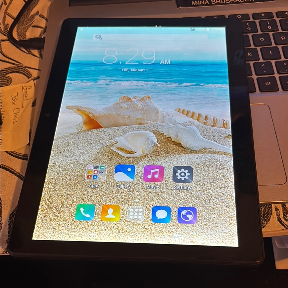 Black Tablet with Beach Display